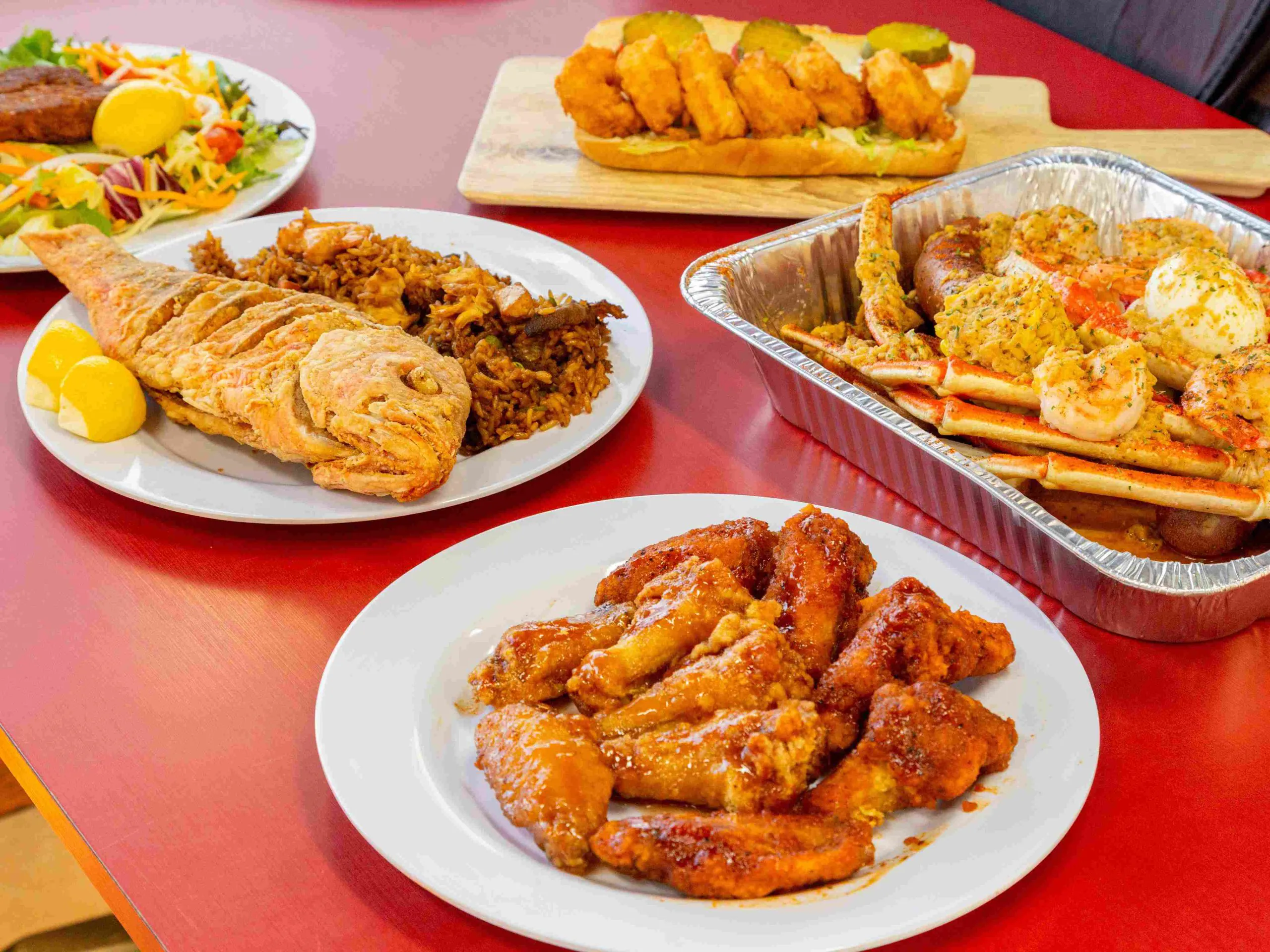 Crispy fried shrimp po' boy sandwich with creamy sauce at This is Seafood, a Seafood Restaurant in District Heights