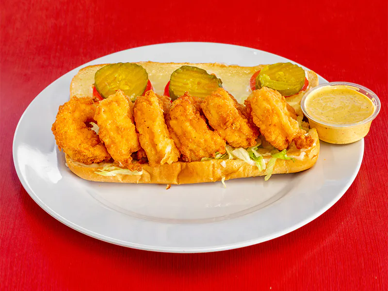 Crispy fried shrimp po' boy with creamy sauce at This is Seafood, a Seafood Restaurant in District Heights
